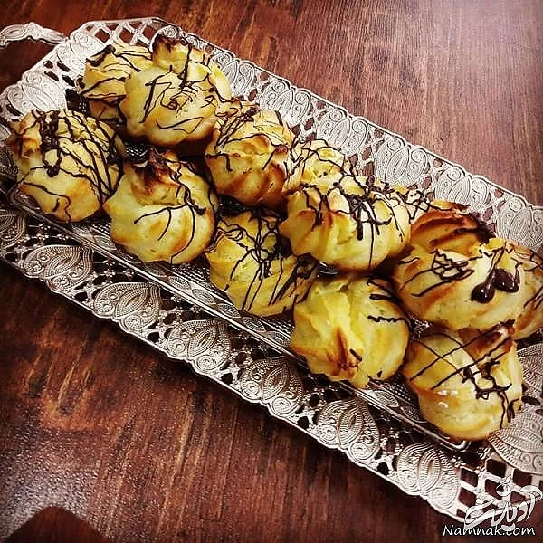 طرز تهیه نان خامه ای با نکات ریز شیرینی خوشمزه